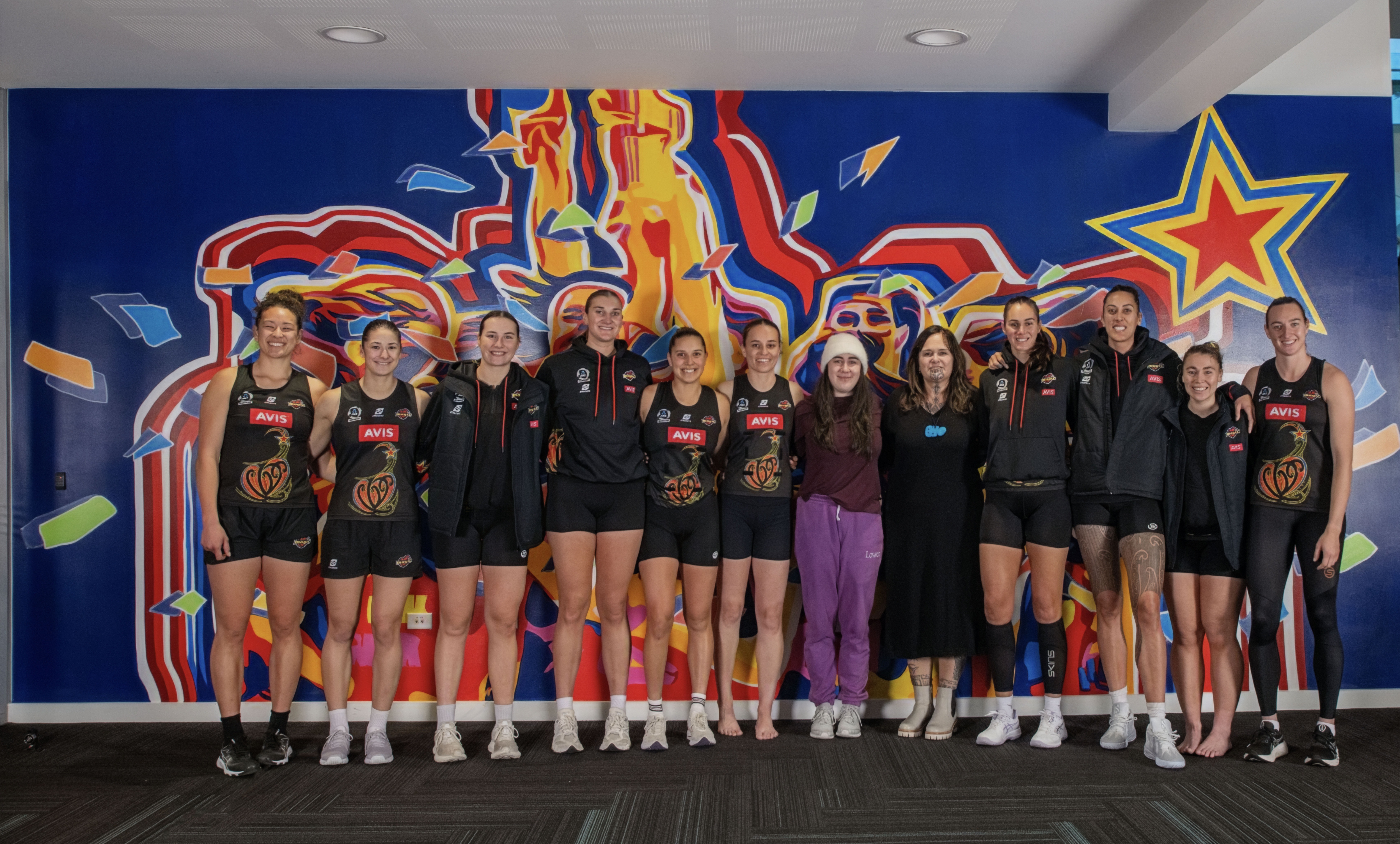 Ahi Tupuna, an ode to teamwork, lights up Mercury Baypark Arena foyer.